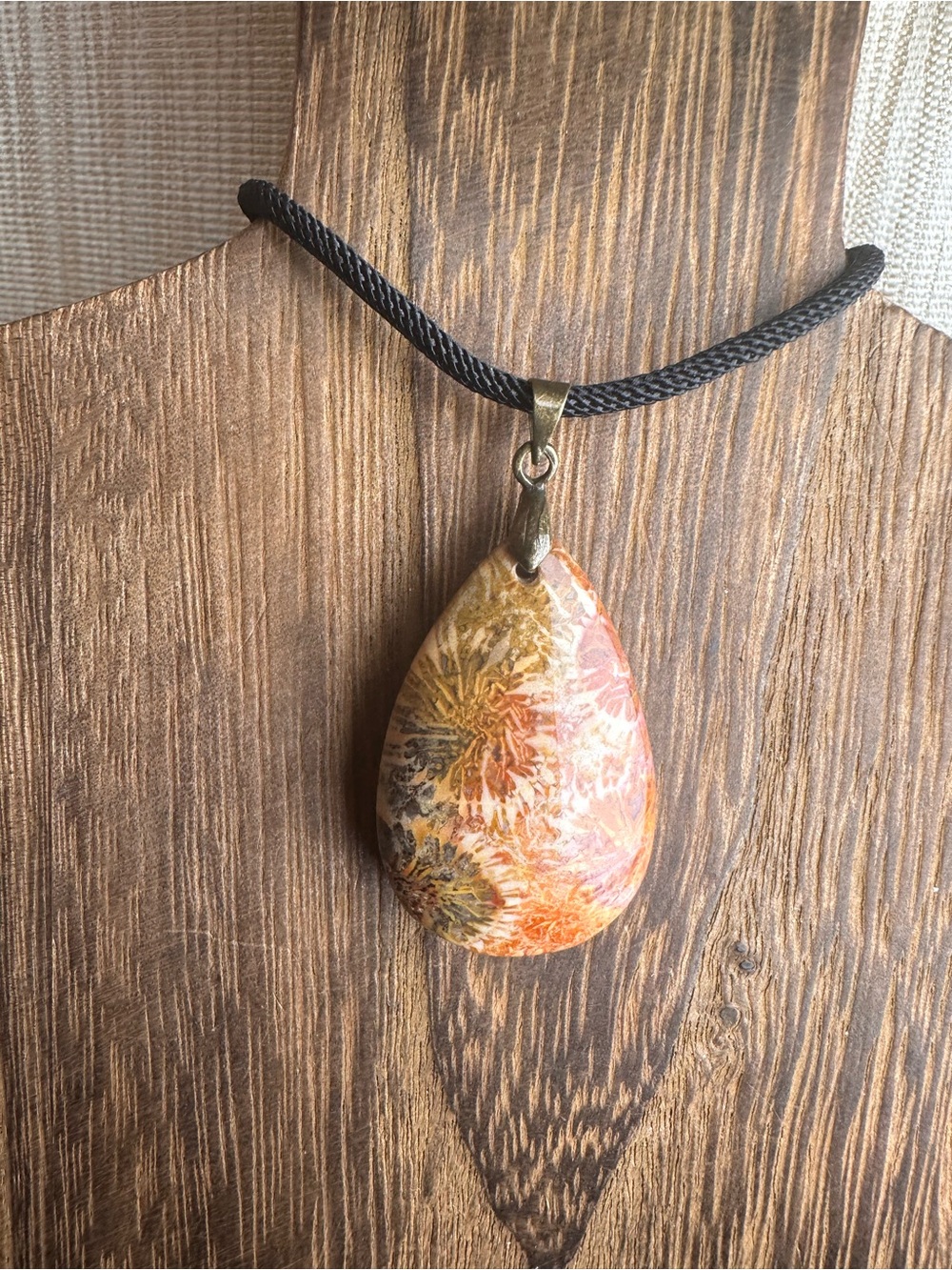 Orange and Black Coral Fossil Teardrop Pendant Necklace on Black Rope - Picture 5 of 16